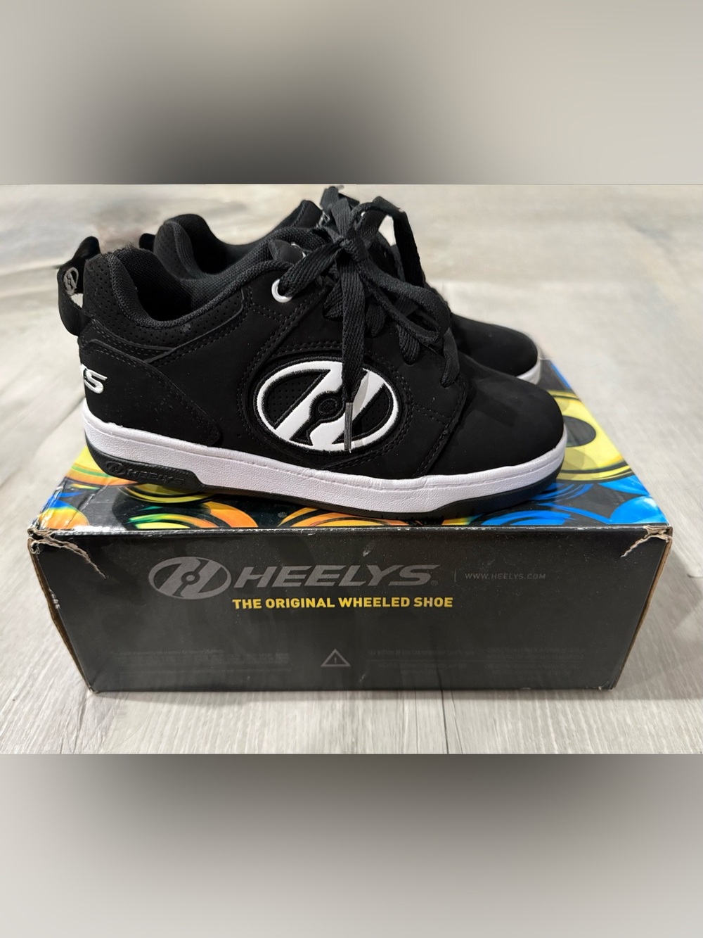 Heelys Kids Black and White Low-Top Wheeled Sneakers